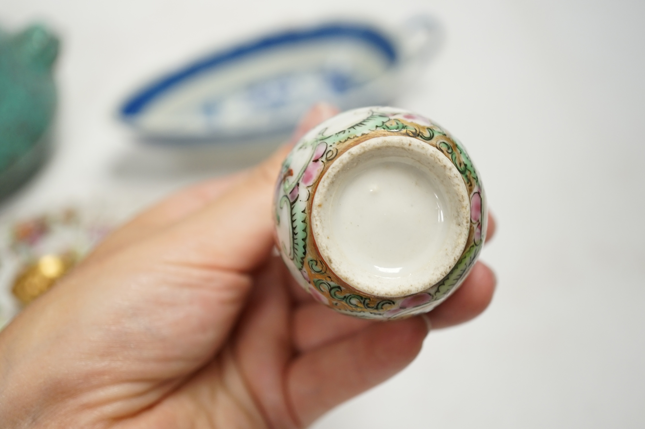 A Chinese robin’s egg glazed censer, a blue and white sauce boat and two famille rose items, largest 17cm diameter. Condition - fair to good